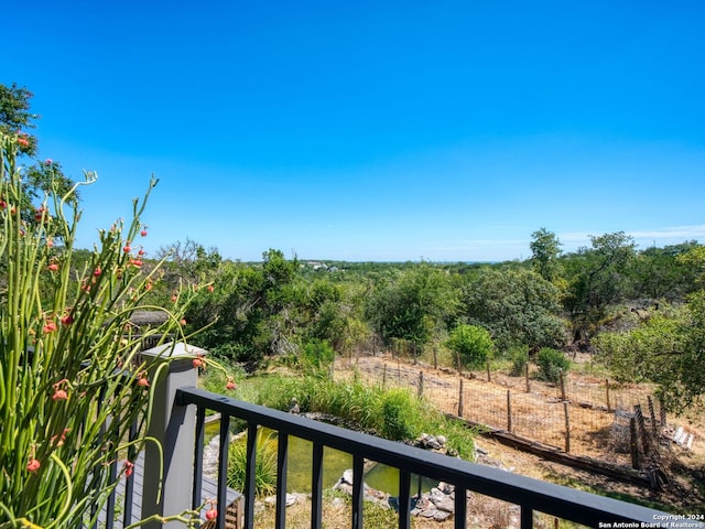 balcony featuring a rural view