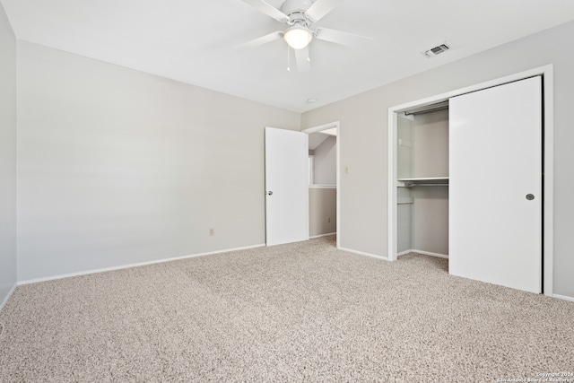 unfurnished bedroom with a closet, ceiling fan, and carpet