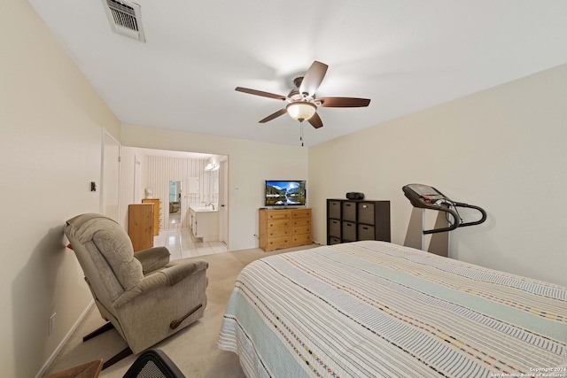 bedroom featuring light colored carpet and ceiling fan