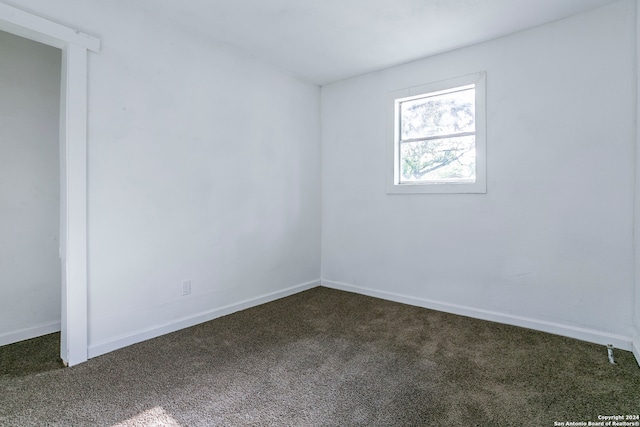 unfurnished room featuring carpet flooring