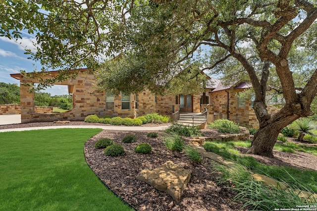 view of front of home with a front yard