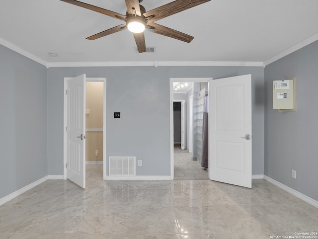 unfurnished room with ornamental molding and ceiling fan