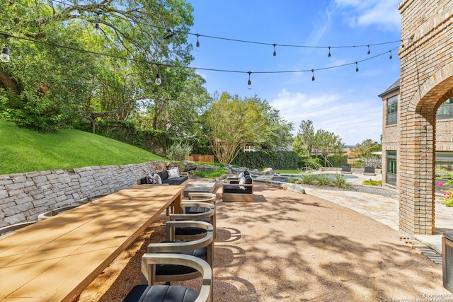 view of patio featuring a swimming pool