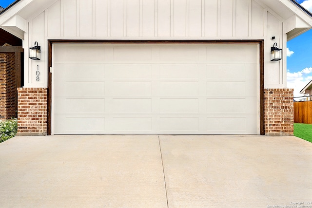 garage featuring wood walls