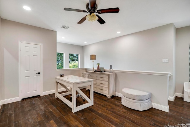 office area with dark wood-type flooring and ceiling fan