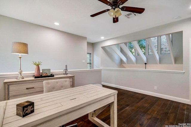 interior space featuring ceiling fan and dark hardwood / wood-style flooring