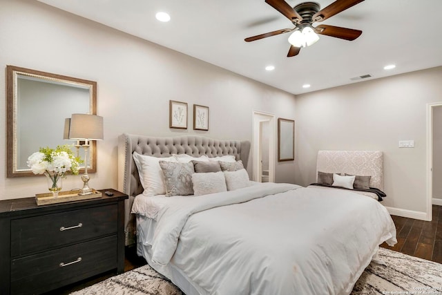 bedroom featuring ceiling fan and dark hardwood / wood-style flooring