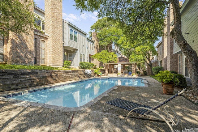 pool featuring a patio