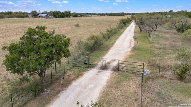 birds eye view of property featuring a rural view