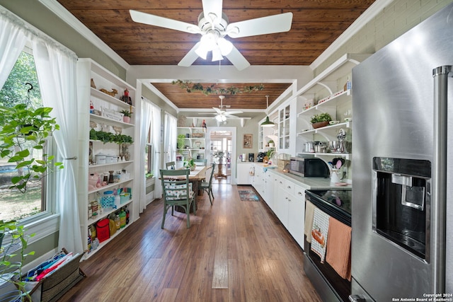 kitchen featuring wood ceiling, appliances with stainless steel finishes, dark hardwood / wood-style flooring, and white cabinets