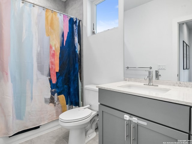 bathroom featuring tile patterned floors, vanity, toilet, and a shower with shower curtain