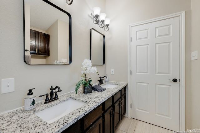 bathroom featuring tile patterned floors and vanity