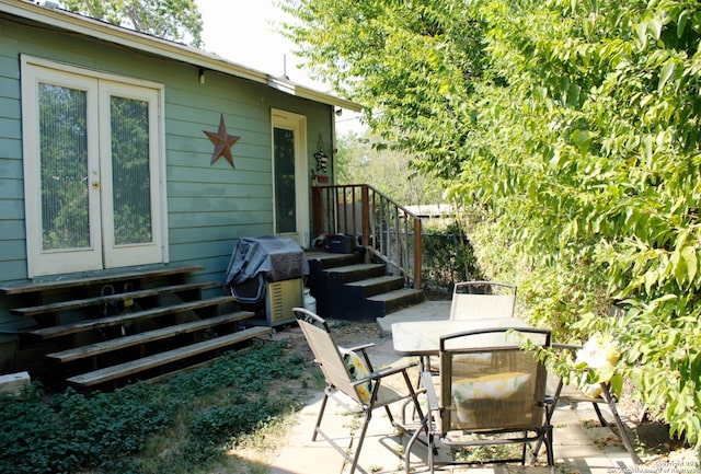 view of patio featuring a grill