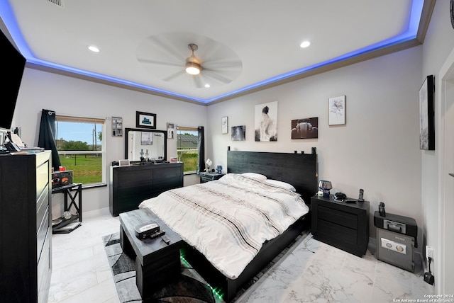 bedroom featuring ceiling fan, ornamental molding, and light tile patterned flooring