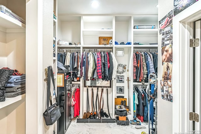 spacious closet with tile patterned flooring