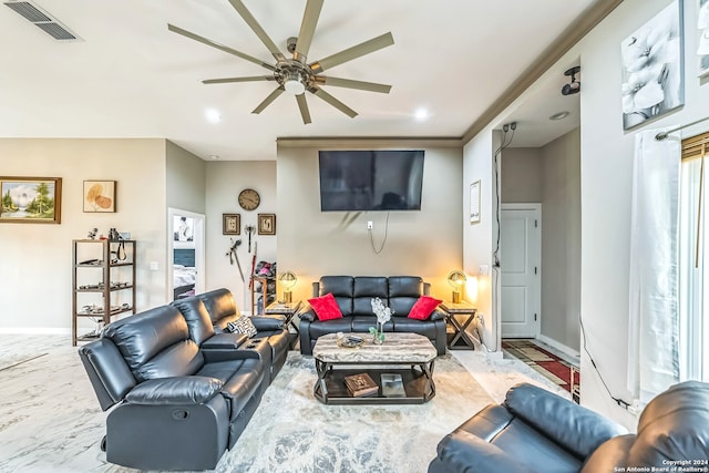 living room featuring ceiling fan and light tile patterned floors