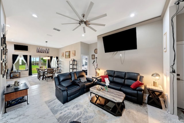 living room with ceiling fan, ornamental molding, and light tile patterned flooring