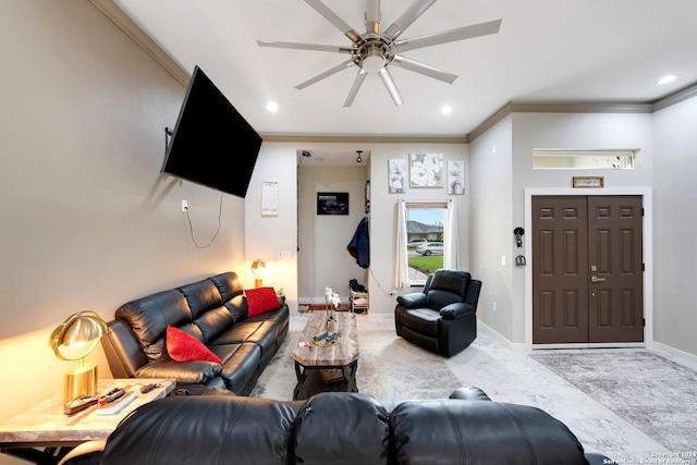 living room with crown molding and ceiling fan