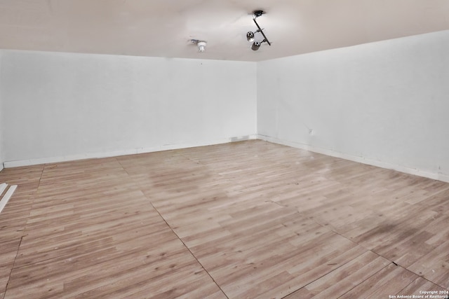 spare room featuring light wood-type flooring