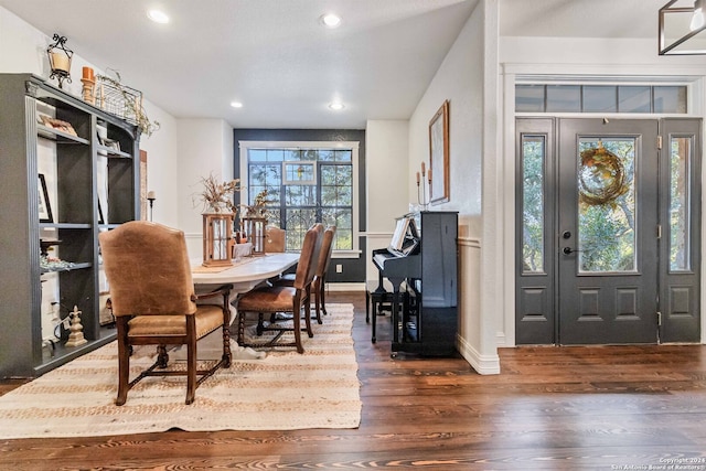 dining space with dark wood-type flooring