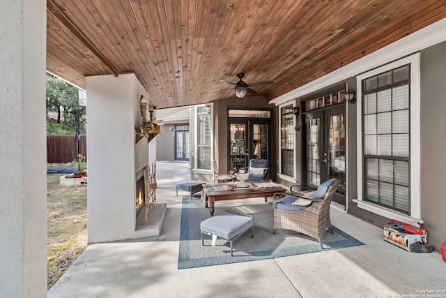 view of patio / terrace featuring ceiling fan