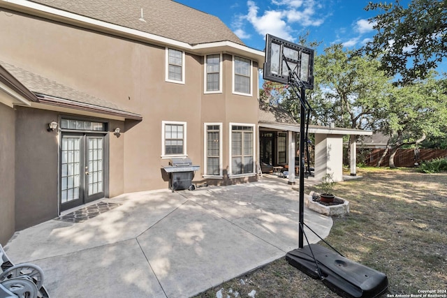 back of property featuring a patio area