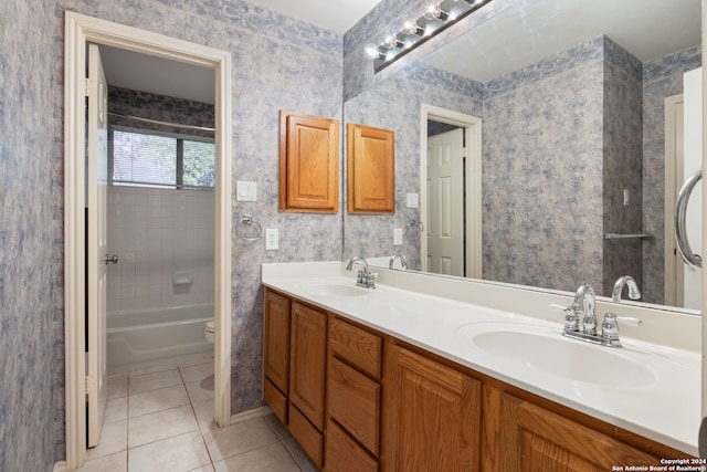 full bathroom with tile patterned flooring, vanity, toilet, and tiled shower / bath combo