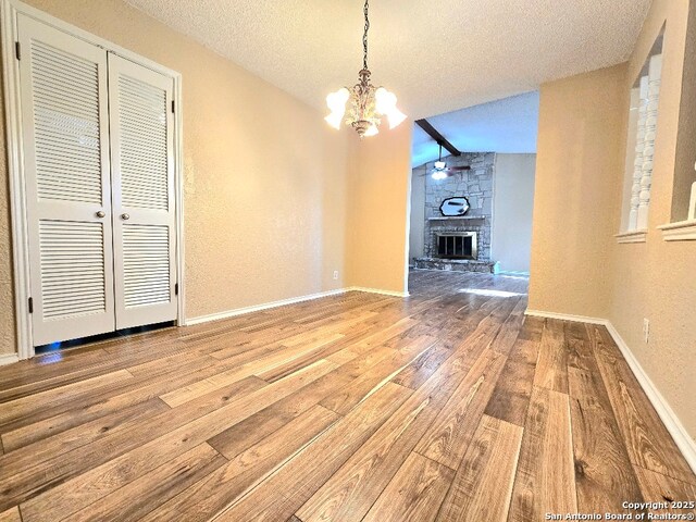 kitchen featuring light tile patterned flooring, sink, ceiling fan, a textured ceiling, and white fridge