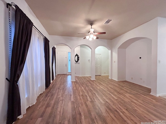 interior space featuring ceiling fan and hardwood / wood-style flooring