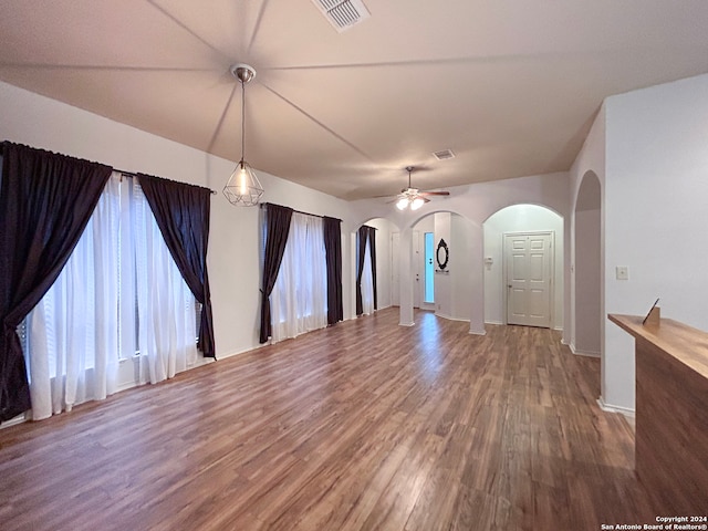 spare room with wood-type flooring and ceiling fan