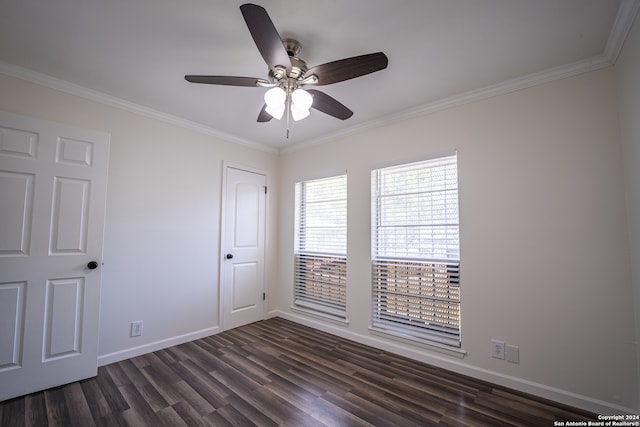 spare room featuring crown molding, ceiling fan, and dark hardwood / wood-style floors