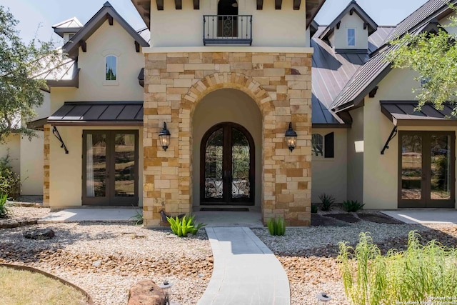 doorway to property featuring french doors