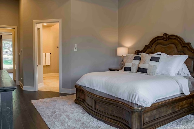 bedroom featuring dark hardwood / wood-style floors