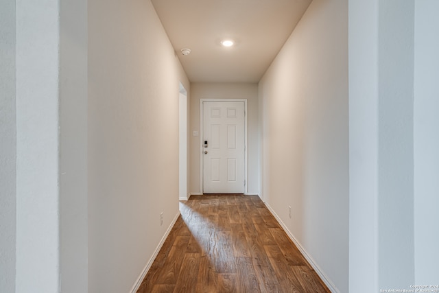 doorway to outside featuring hardwood / wood-style flooring