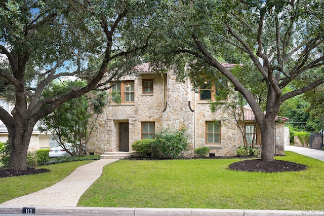 view of front of house with a front yard