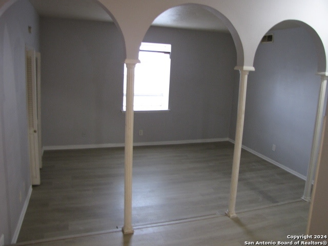 interior space with hardwood / wood-style floors