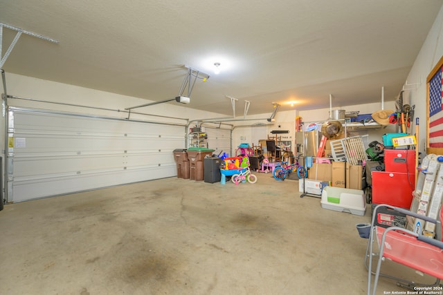 garage featuring a garage door opener