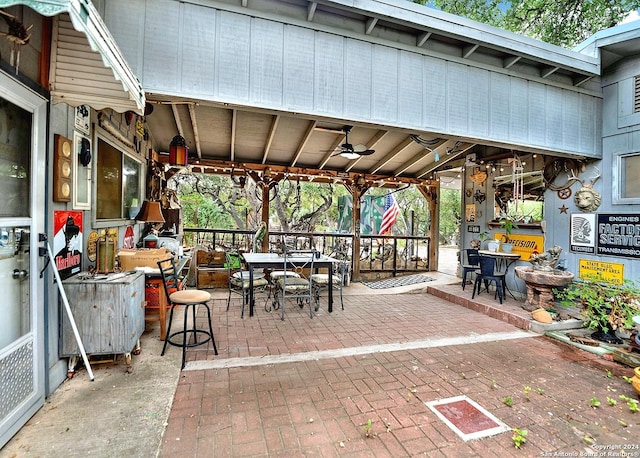 view of patio featuring outdoor dining area