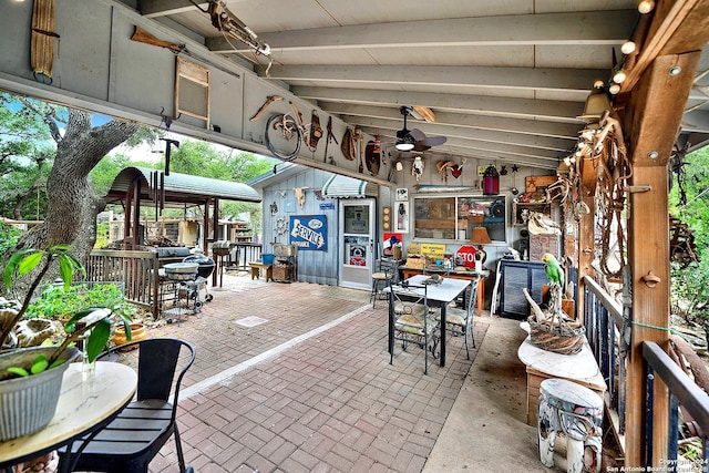 view of patio featuring a ceiling fan