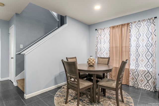 view of tiled dining space