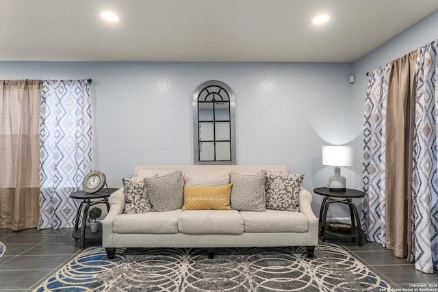 living room featuring tile patterned flooring and recessed lighting