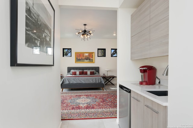 tiled bedroom featuring sink