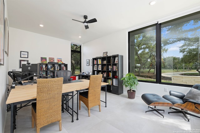 home office with ceiling fan and plenty of natural light