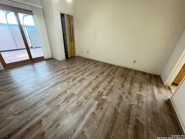 empty room featuring hardwood / wood-style flooring