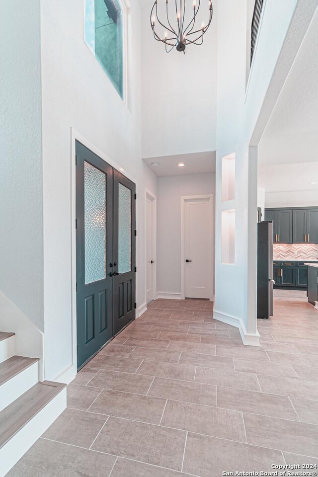 entrance to property with a lawn and a garage