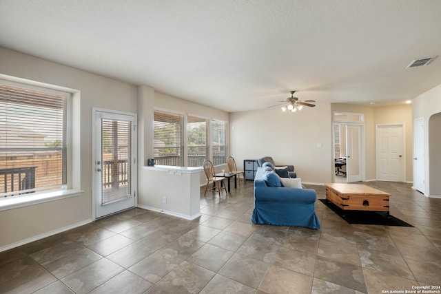 living room with ceiling fan