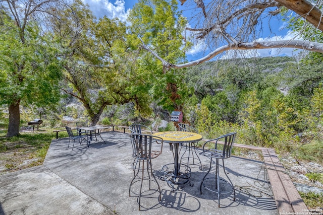 view of patio with outdoor dining area