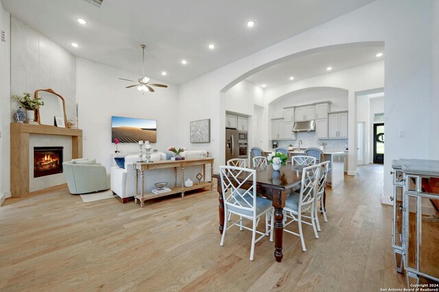 dining room featuring light hardwood / wood-style flooring and ceiling fan