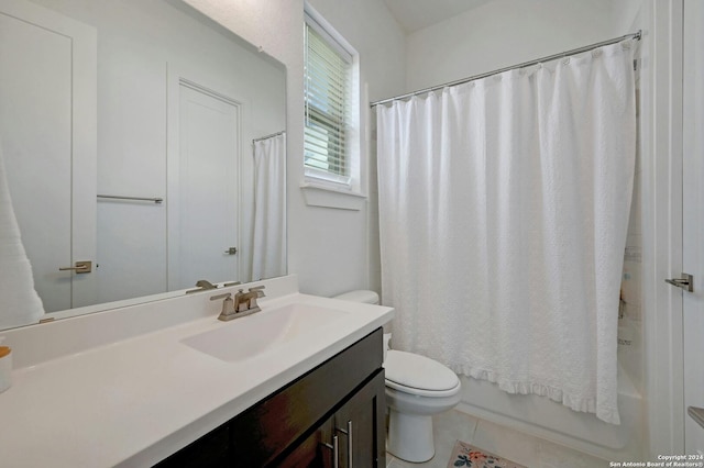 full bathroom with toilet, vanity, shower / tub combo with curtain, and tile patterned floors