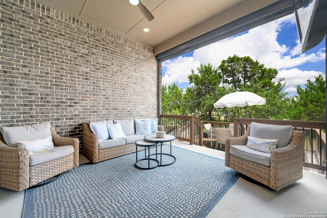 view of patio featuring outdoor lounge area and a deck